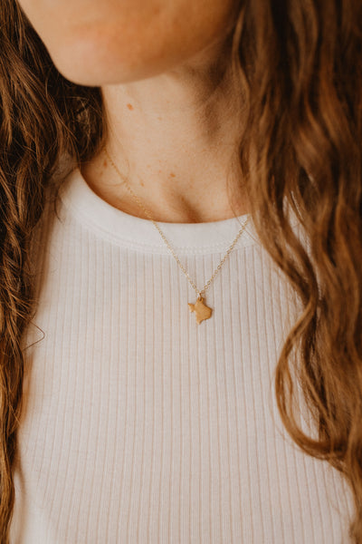 Handcrafted Texas Necklace by Valerie Morgan Jewelry in Bronze and Sterling Silver – Elegant State Silhouette Pendant.